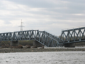 РУСАЛ по суду взыскал миллионы рублей со страховщиков за обрушение моста в Хакасии